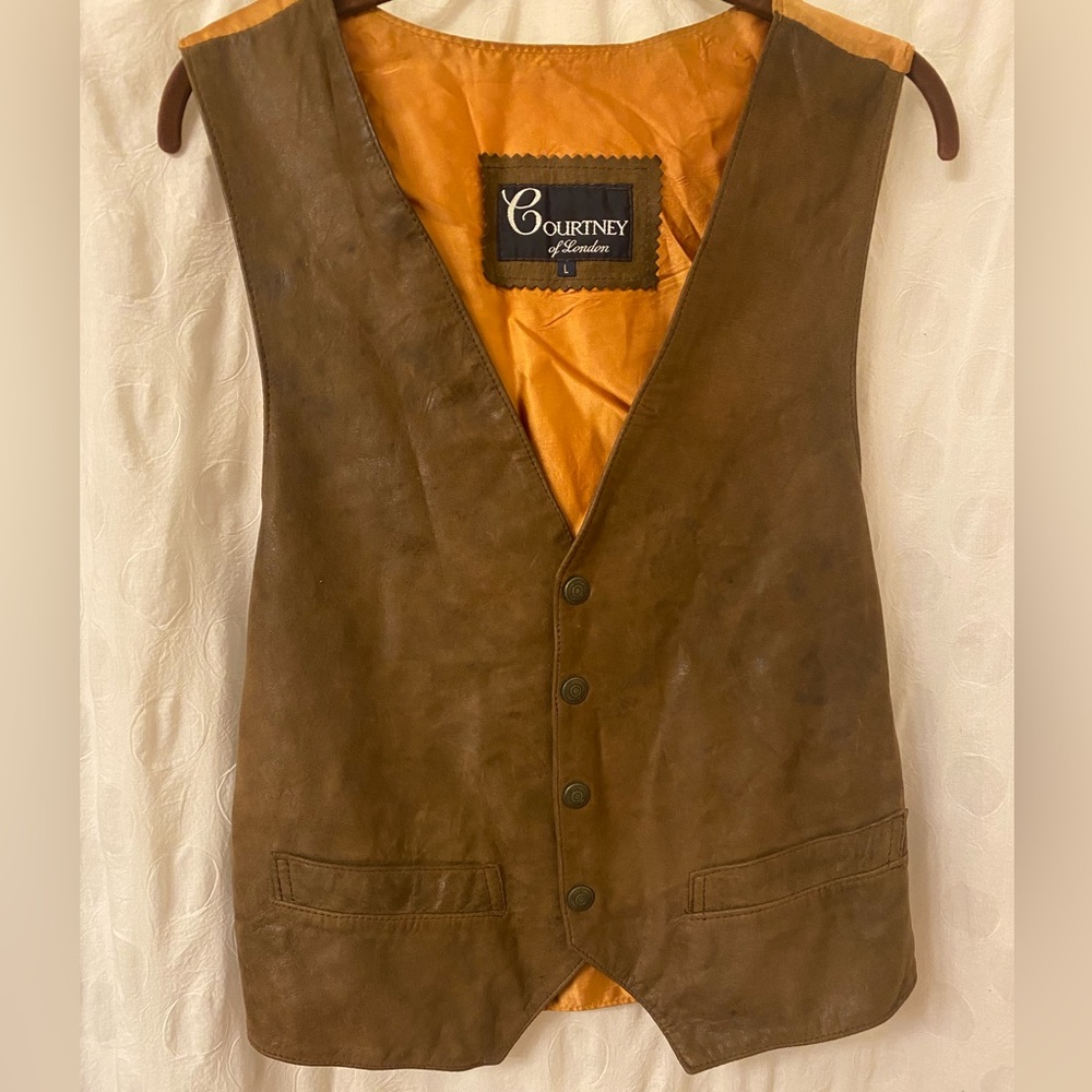 COPY - Size large vintage leather vest with snap button front.